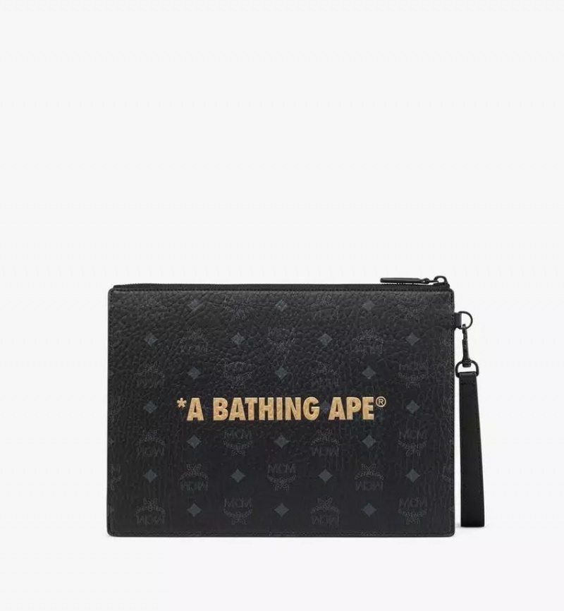 Clutch MCM Worldwide MCM x BAPE Wristlet Zip Pouch in Visetos Čierne | 281065-FMI