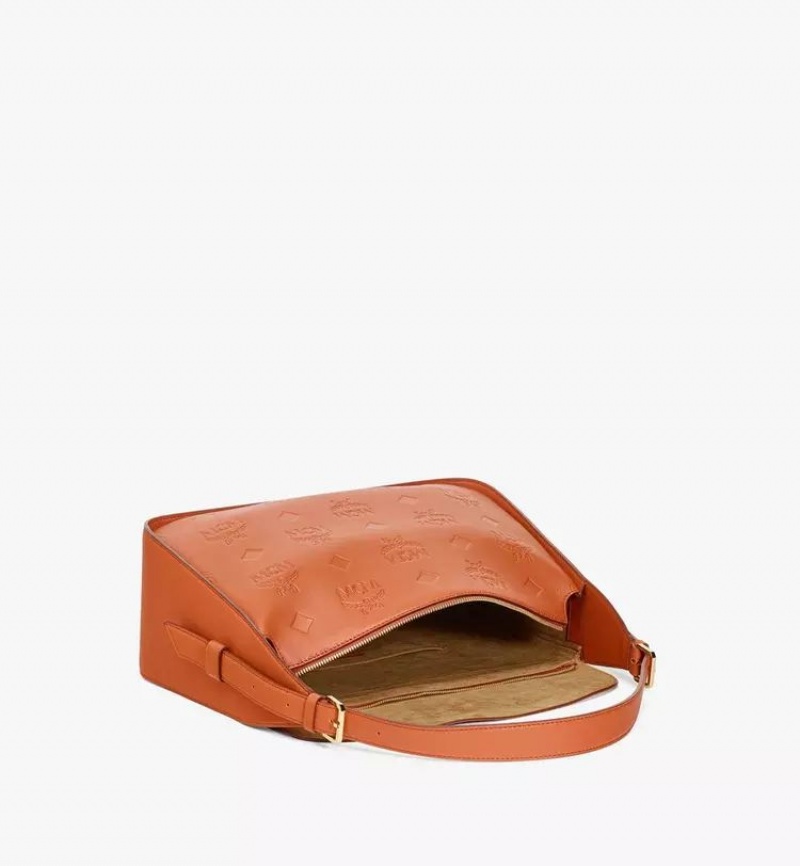 Taška Cez Rameno MCM Worldwide Aren Flap Hobo in Embossed Monogram Kozene Hnede | 923485-FNQ