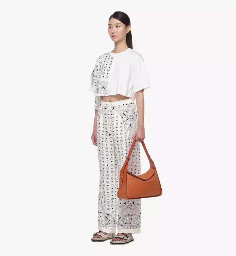 Taška Cez Rameno MCM Worldwide Aren Flap Hobo in Embossed Monogram Kozene Hnede | 923485-FNQ